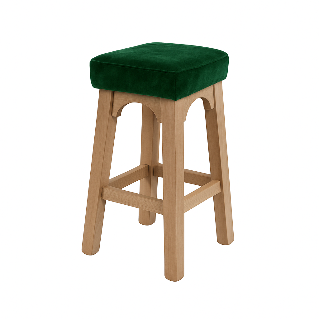 A green velvet bar stool featuring a wooden frame, ideal for modern decor.