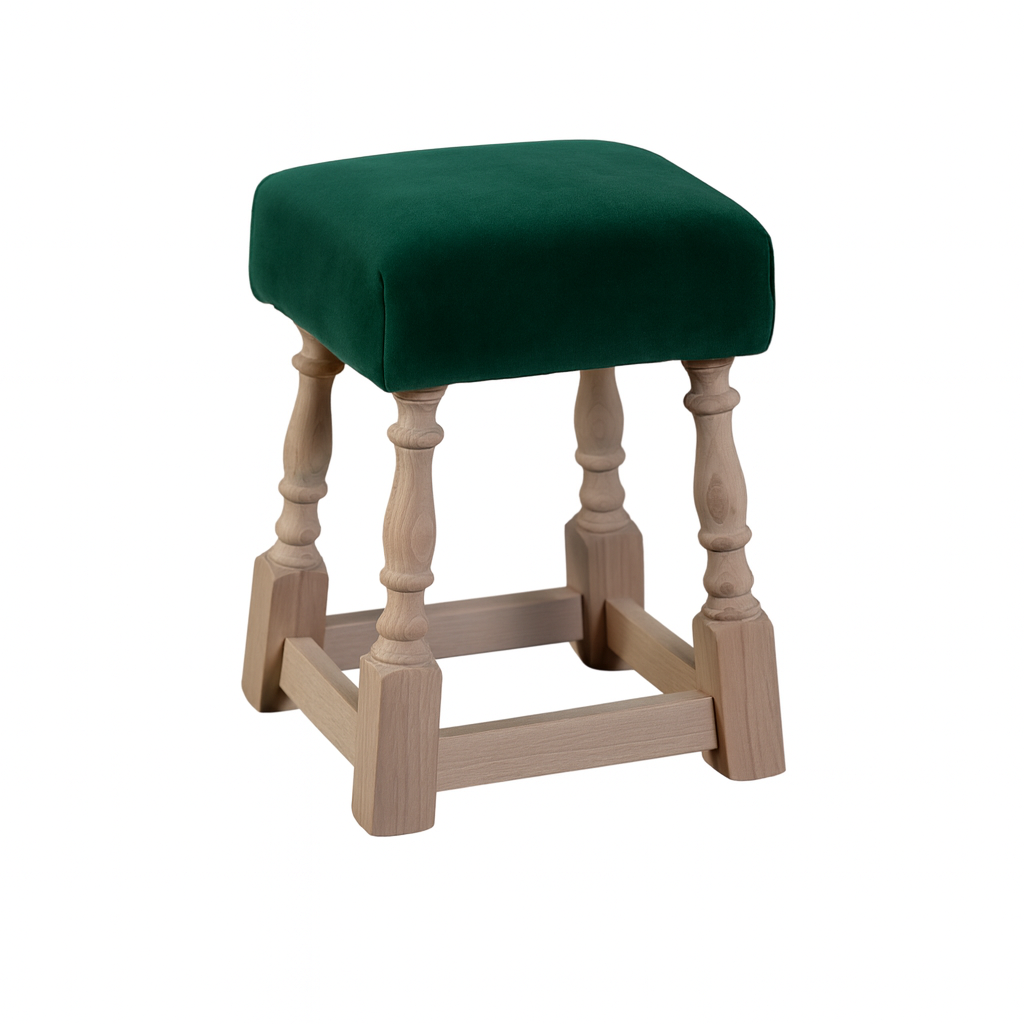 Stylish green cushioned stool with wooden legs and classic design