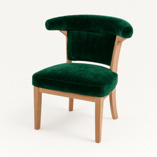 Stylish green velvet chair featuring a unique back design and light wooden legs