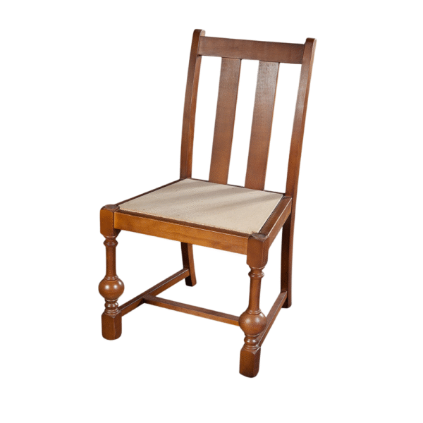 A classic wooden chair featuring a cane seat and vertical slats in a warm brown finish.