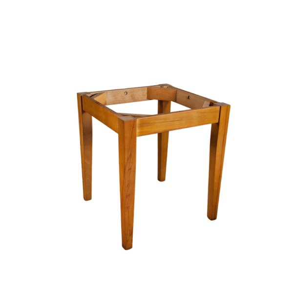 A simple, unfinished wooden table frame with four legs, emphasizing minimalist design.