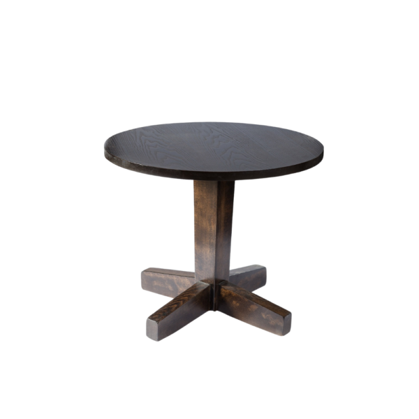 Dark wood round side table with a dotted design on the top and a sturdy four-legged base.