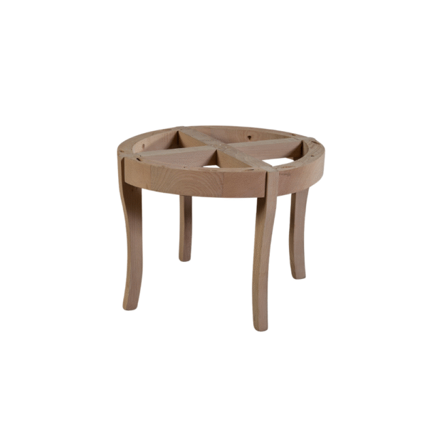 A minimalist wooden round stool with four legs and a unique geometric design.