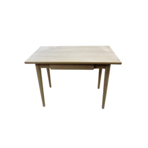 A minimalist wooden dining table featuring a drawer, suitable for dining and workspace use.