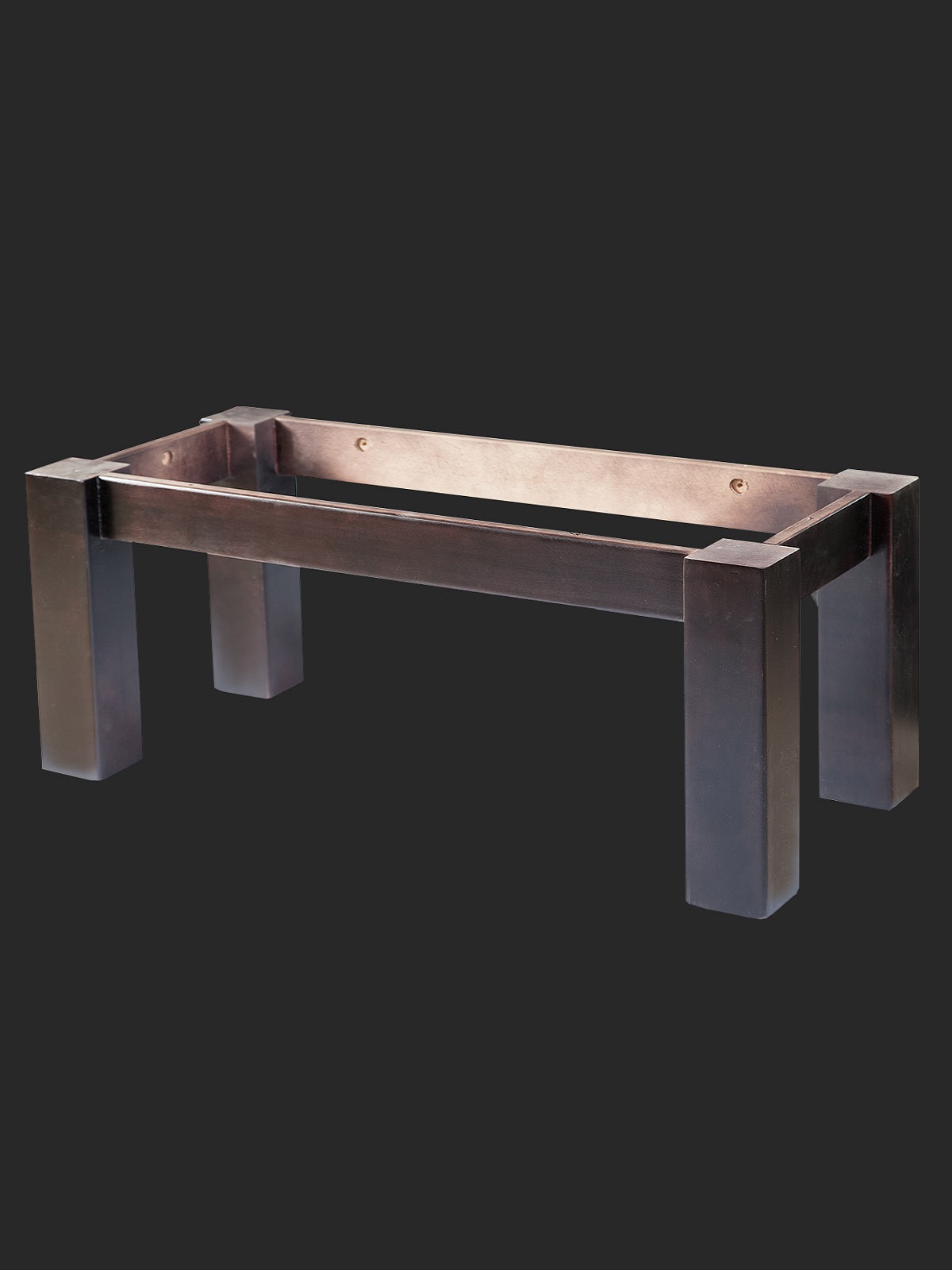 A modern metal fire pit base with a rectangular design and sturdy legs, suitable for outdoor gatherings.