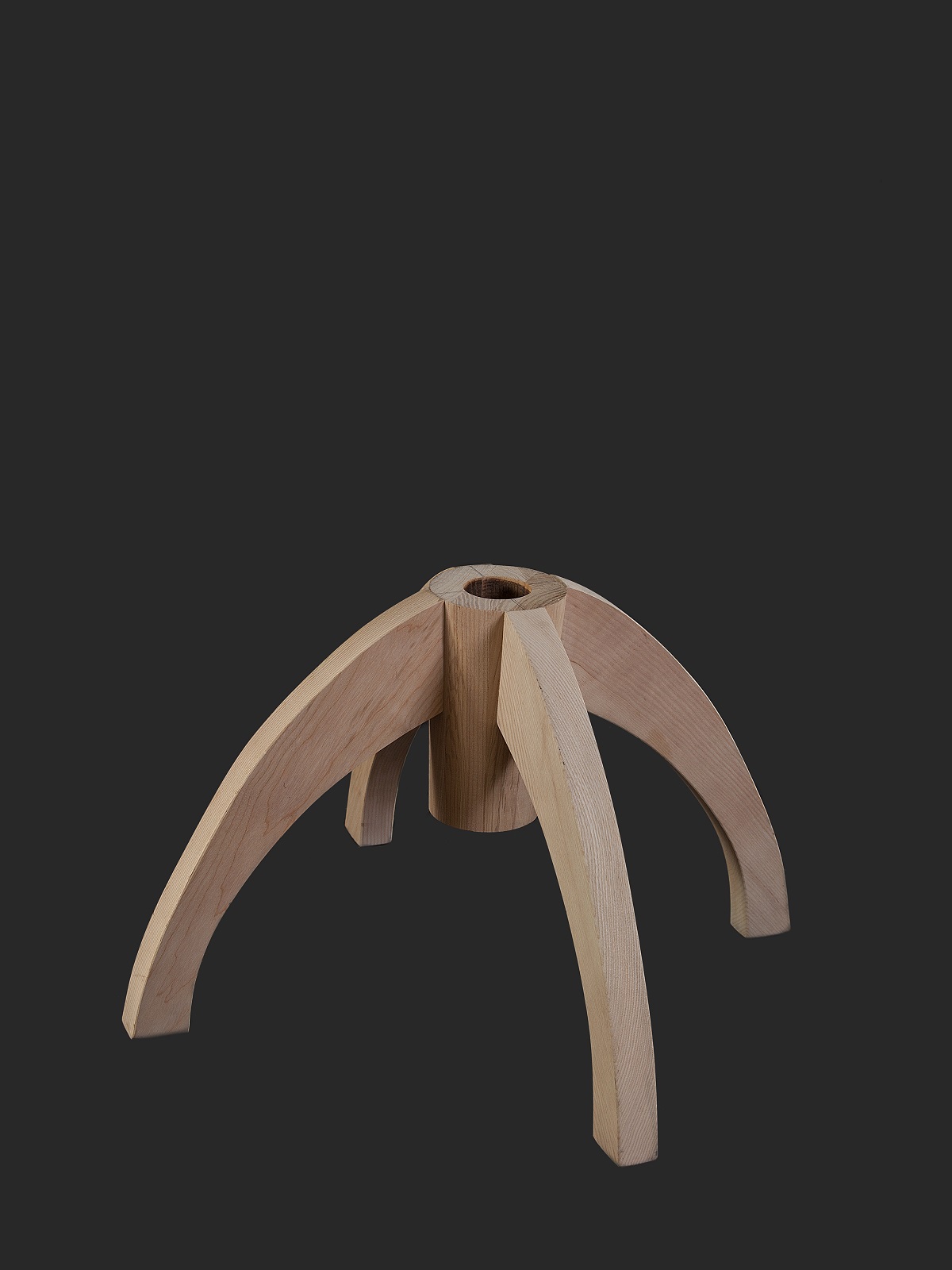 Stylish wooden stand featuring four elegant legs, designed for stability and aesthetic appeal.