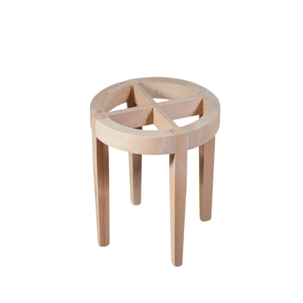 A simple, light-colored wooden stool featuring a round seat with a star-shaped cutout and four straight legs