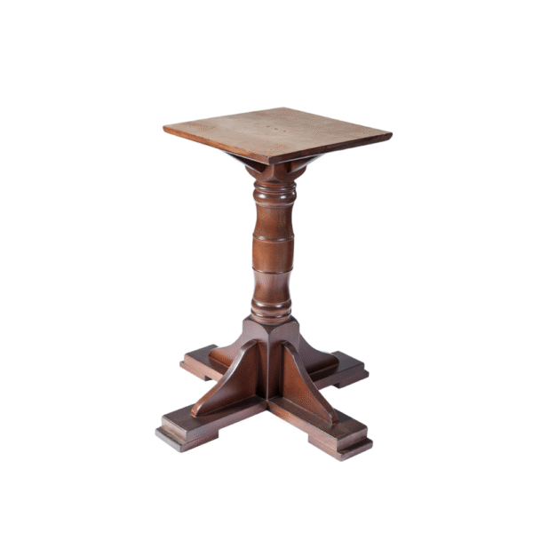 A vintage wooden side table featuring a square top and a beautifully detailed pedestal base.